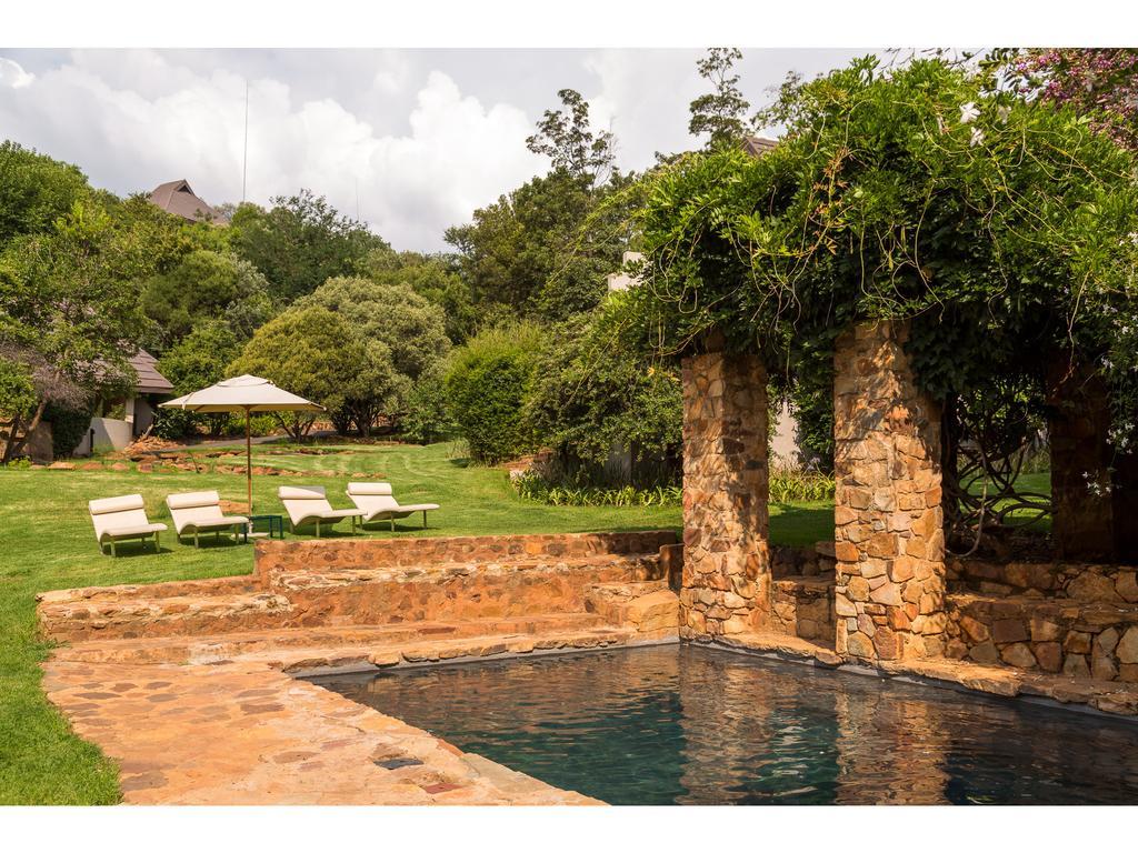 Mount Grace Hotel & Spa Magaliesburg Exterior photo The swimming pool at the retreat